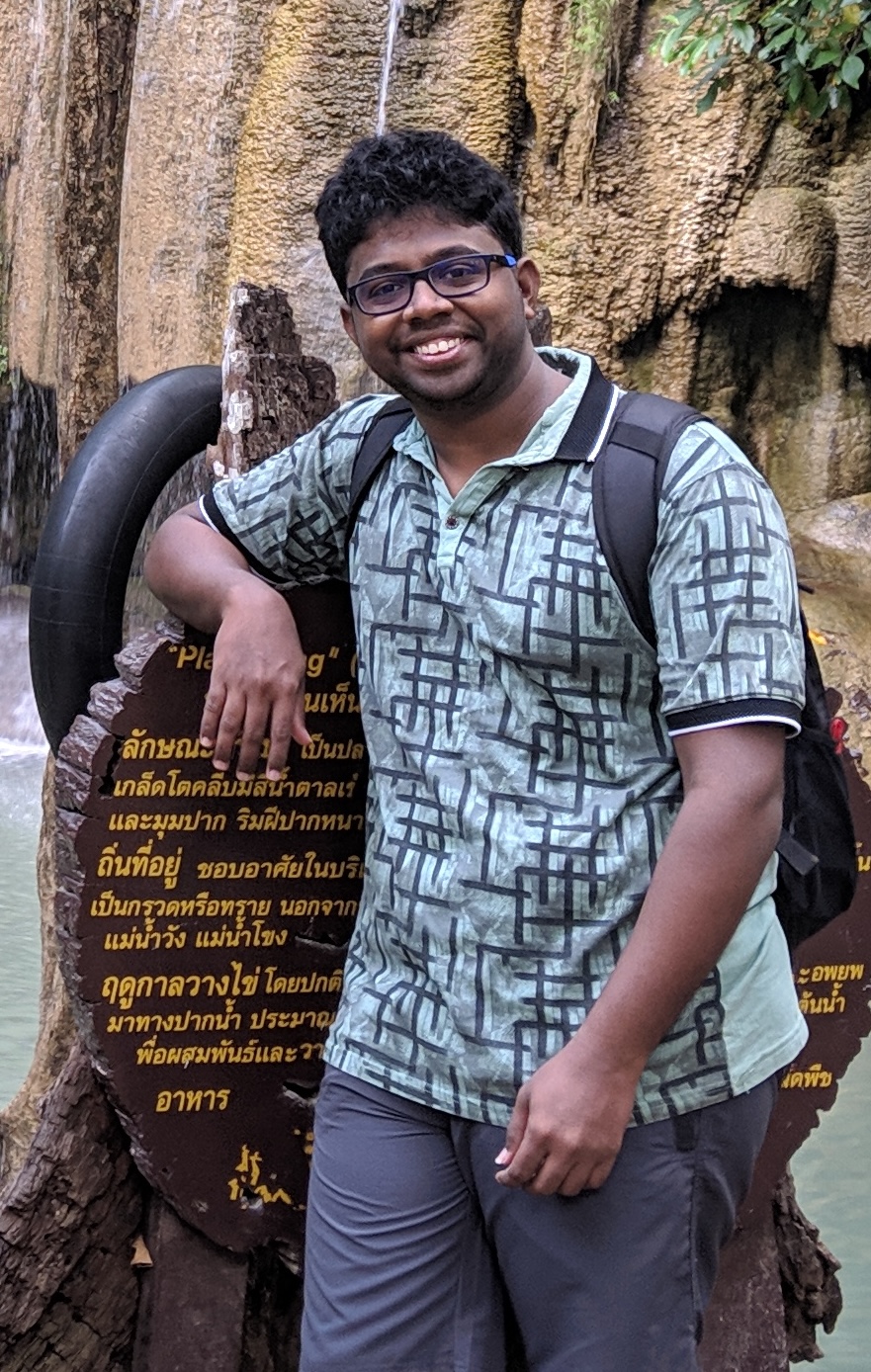 Raghu at Erawan waterfalls, Thailand 2019 — before his fitness transformation